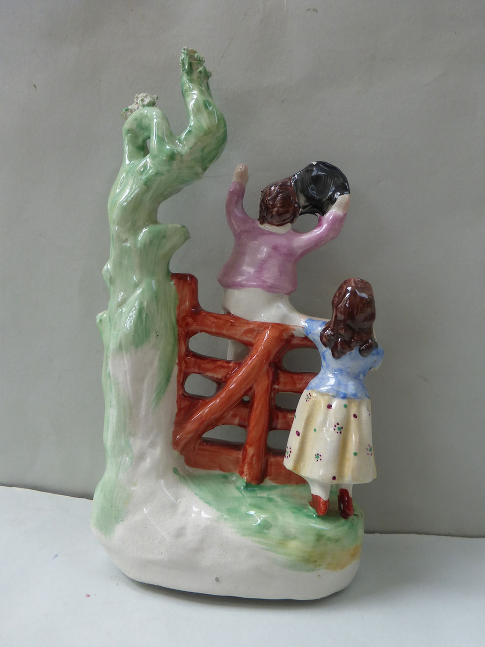 Thumbnail: 19THC STAFFORDSHIRE WILLIAM KENT GROUP OF A BOY SEATED ON FENCE