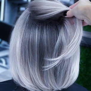 Short silver blonde bob created using the AirTouch highlighting technique at Color Castle NY in Park Slope Brooklyn.