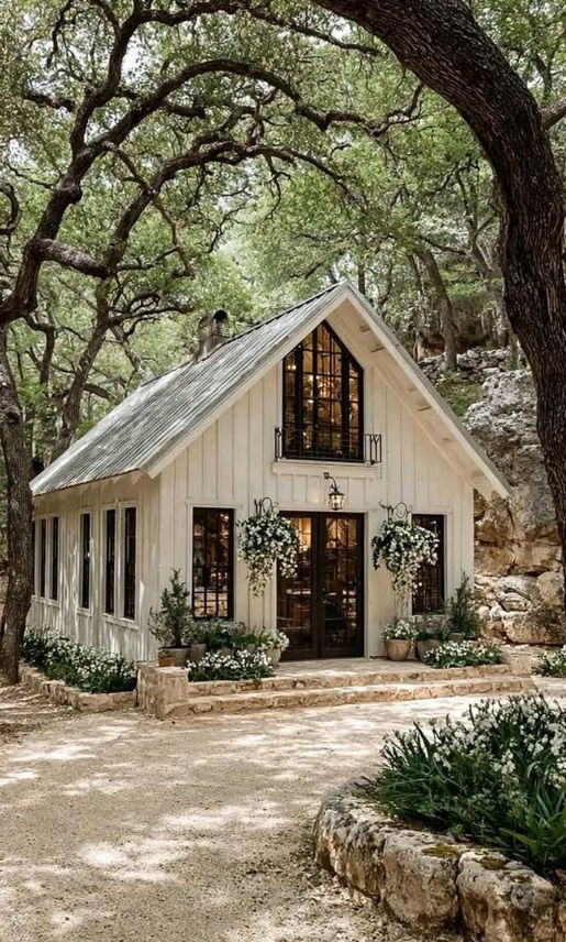 Eye-level view of a modern accessory dwelling unit with a small garden in front