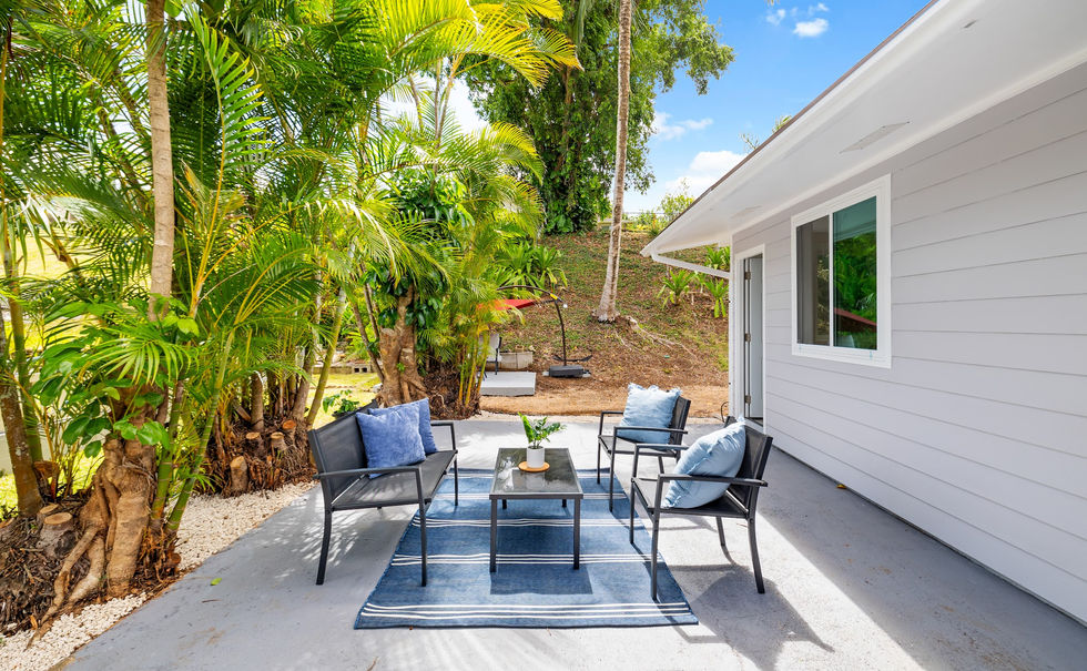 Tranquility abounds in this one-story home with ocean blue accents