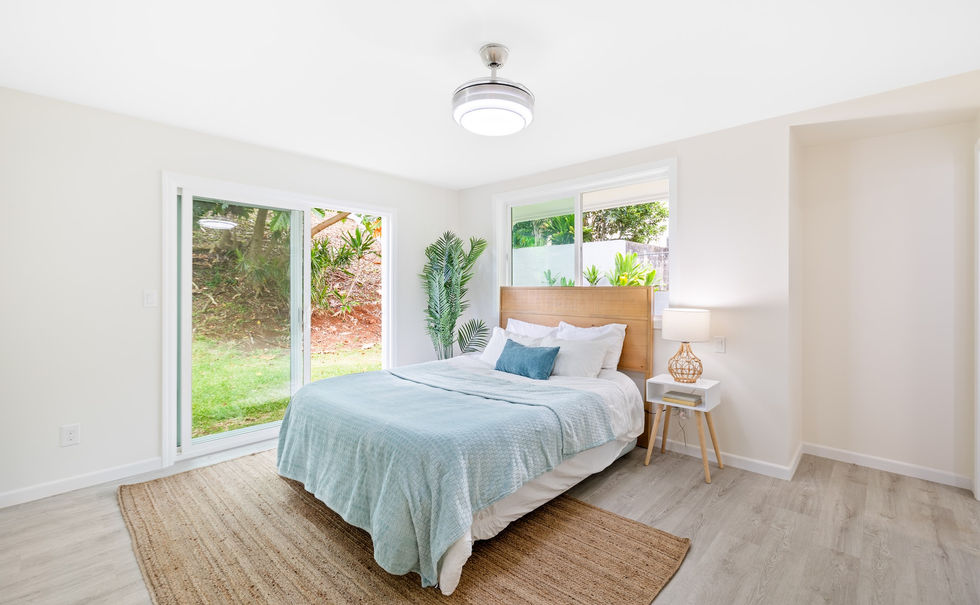 Open concept living space with refreshing green and blue tones