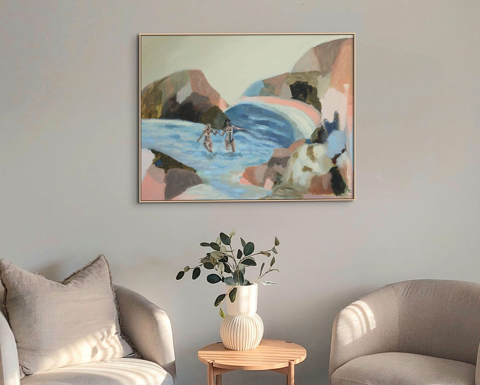 Contemporary coastal sitting room with curved white armchairs, textured vase and art by Lauren Esplin