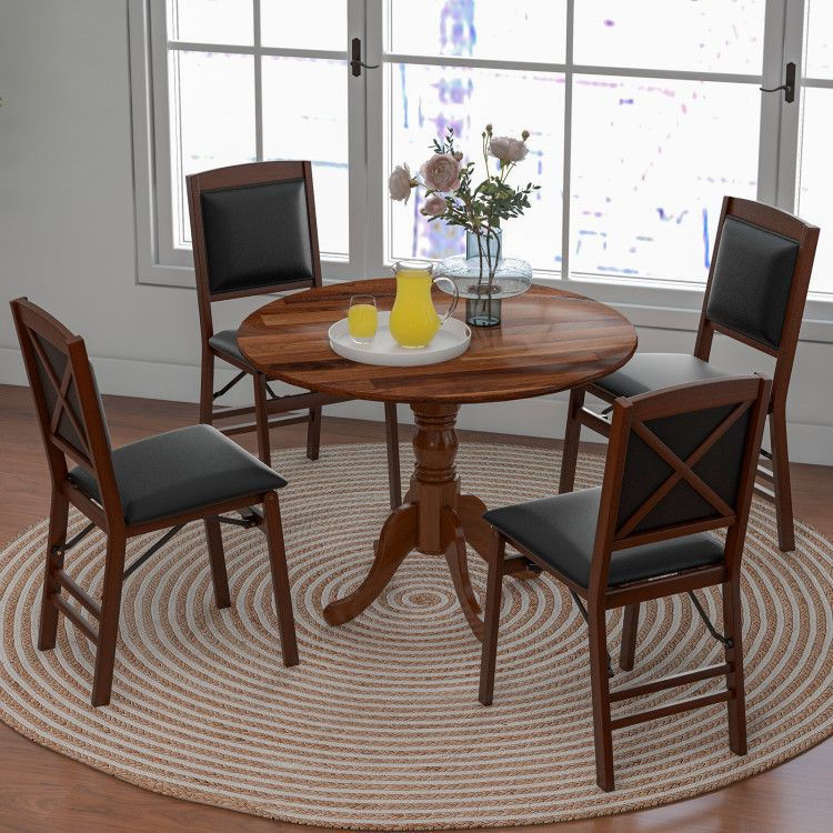Thumbnail: Wooden Dining Table with Round Tabletop and Curved Trestle Legs