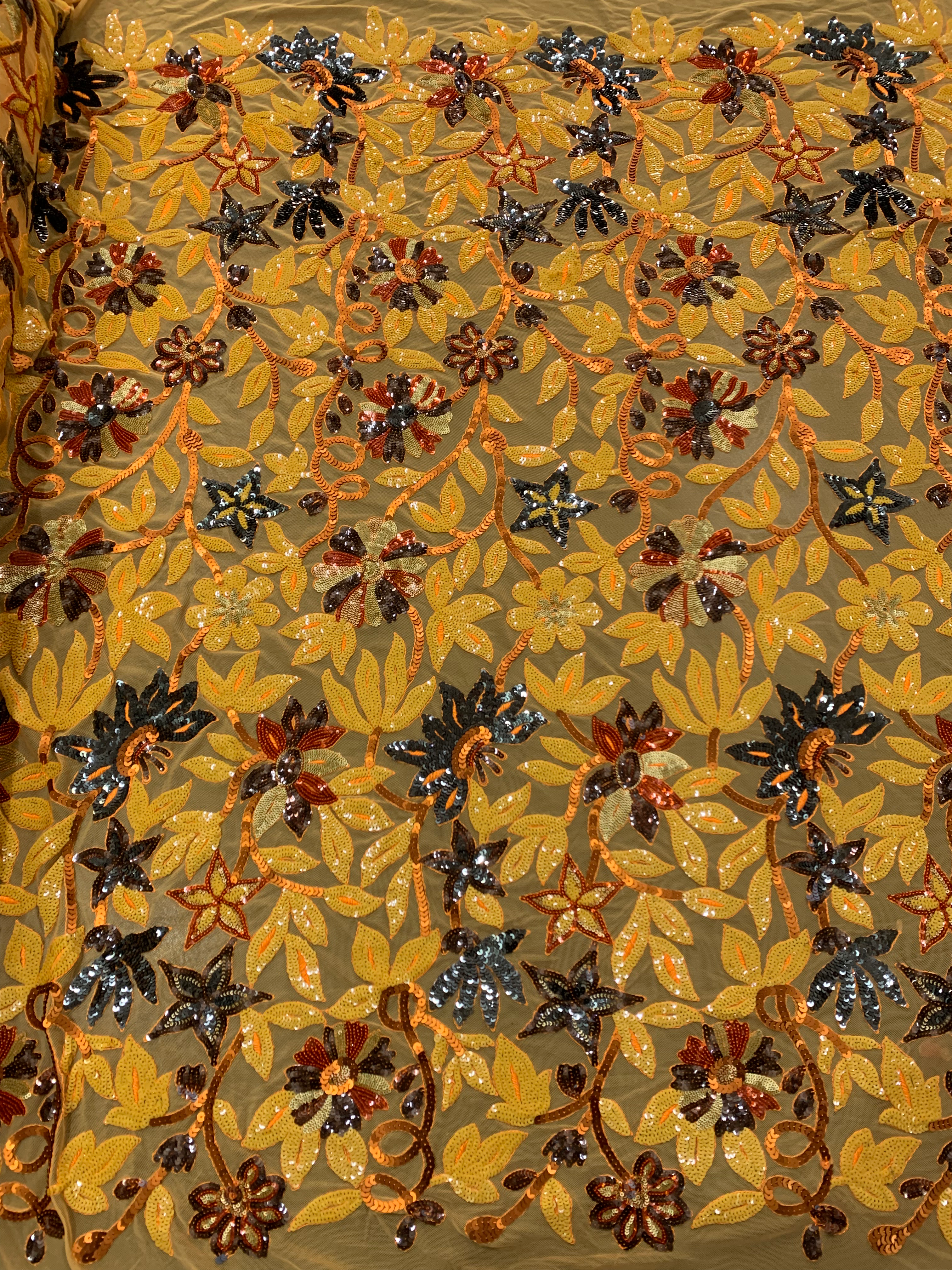 TUL INGLES BORDADO NARANJA FLORES C/ LENTEJUELA