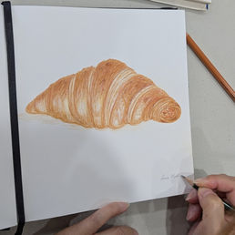 Casual Class - coloured pencil drawing of a croissant