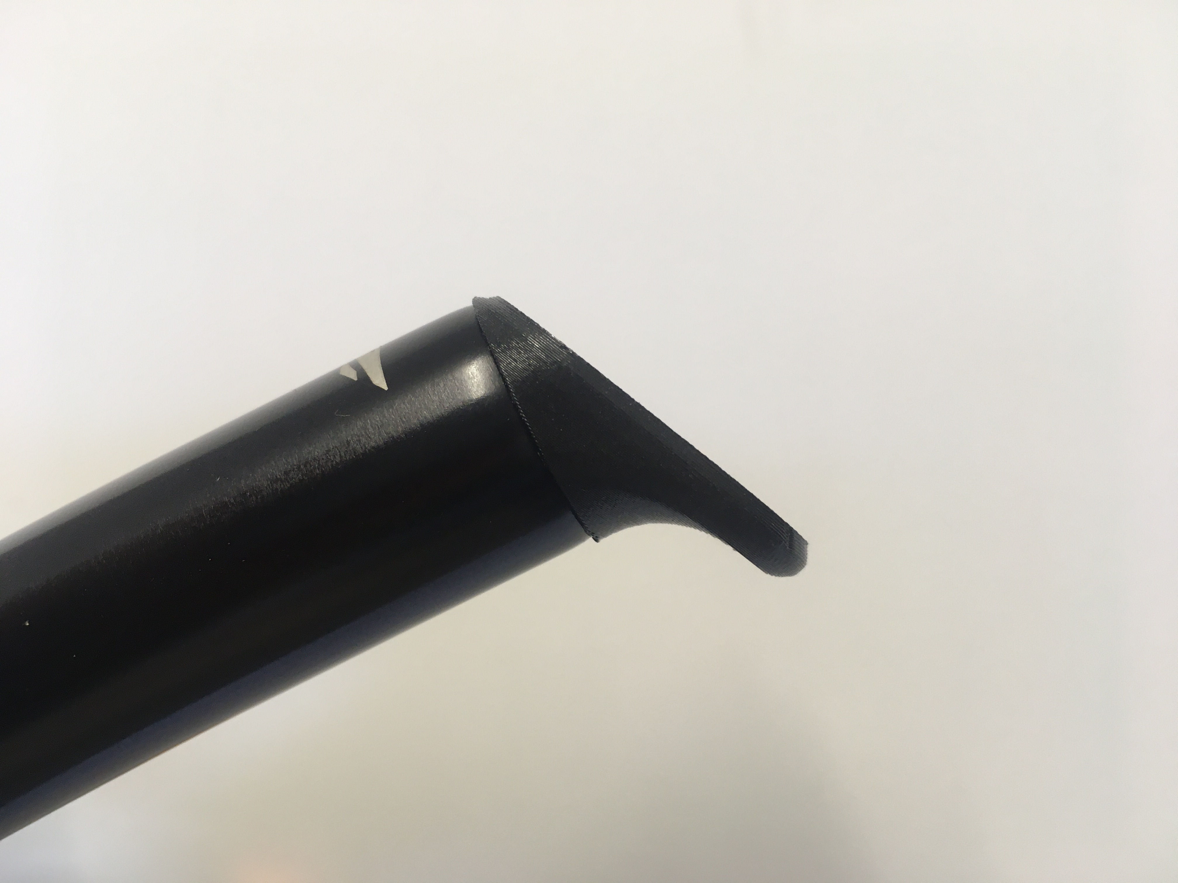 Black Track Aerobar extension Finger Lock Plug side view