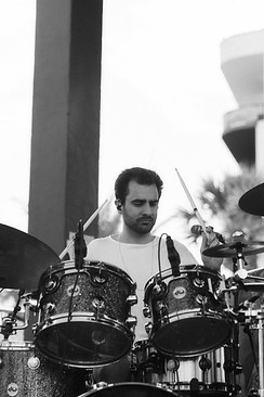 Eli Cherry playing drums with Caye at Hangout festival