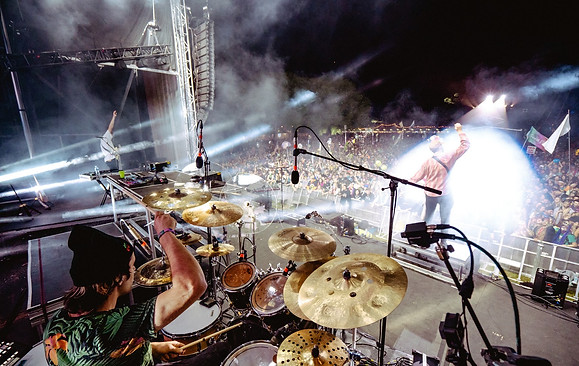 Eli Cherry playing drums with San Holo at Okeechobee festival