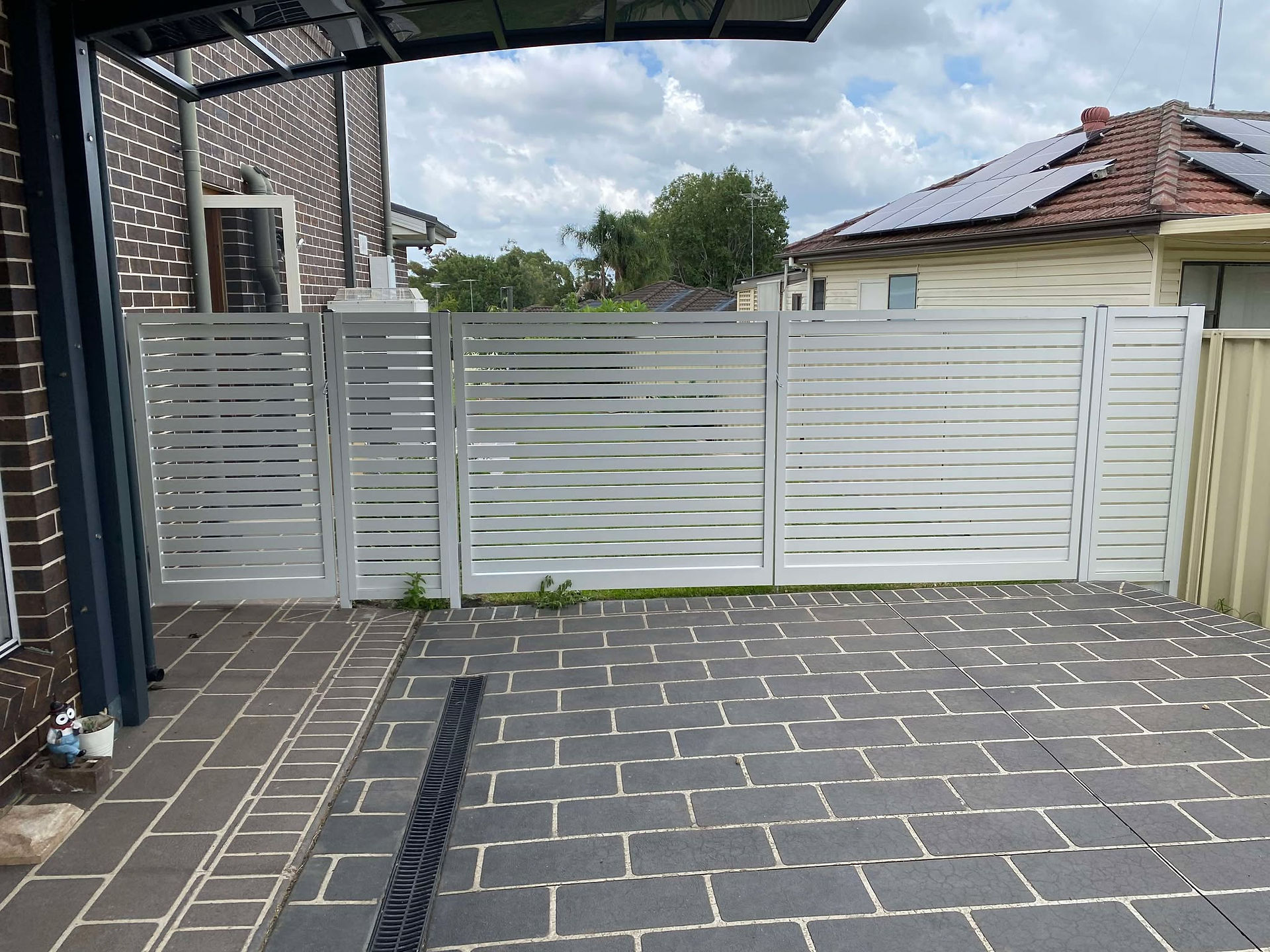 aluminium slat gate with powder-coated finish for durability and low maintenance.