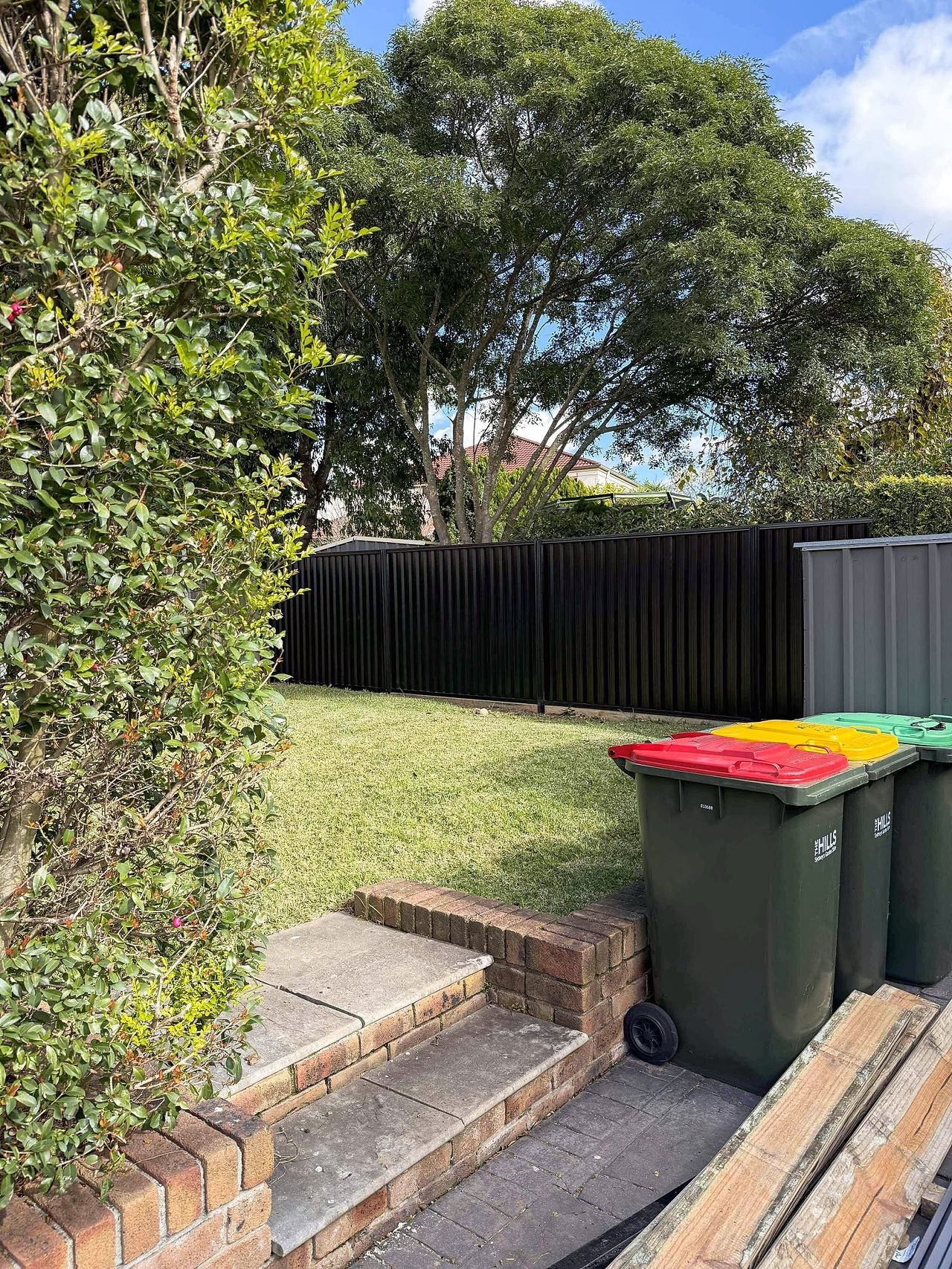 Modern Colorbond steel fence providing low-maintenance privacy for a residential property.