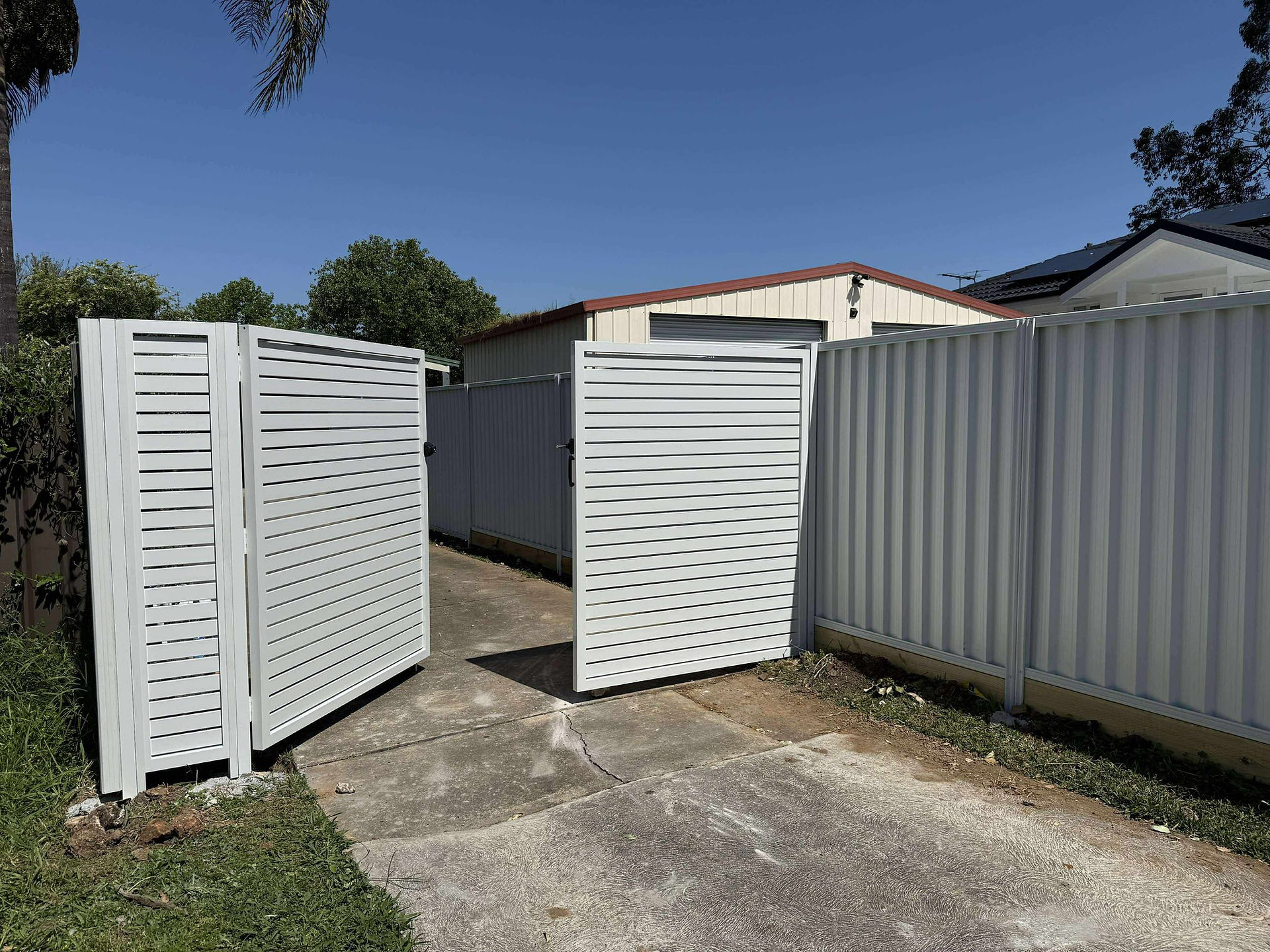 Custom aluminium slat gate installed with welded frame for long-term strength.