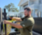 Joel installing a blade fence in Kellyville, expert fencing installation service