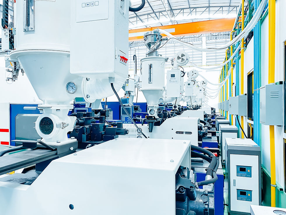 Close-up view of a precision injection molding tool in a Malaysian factory