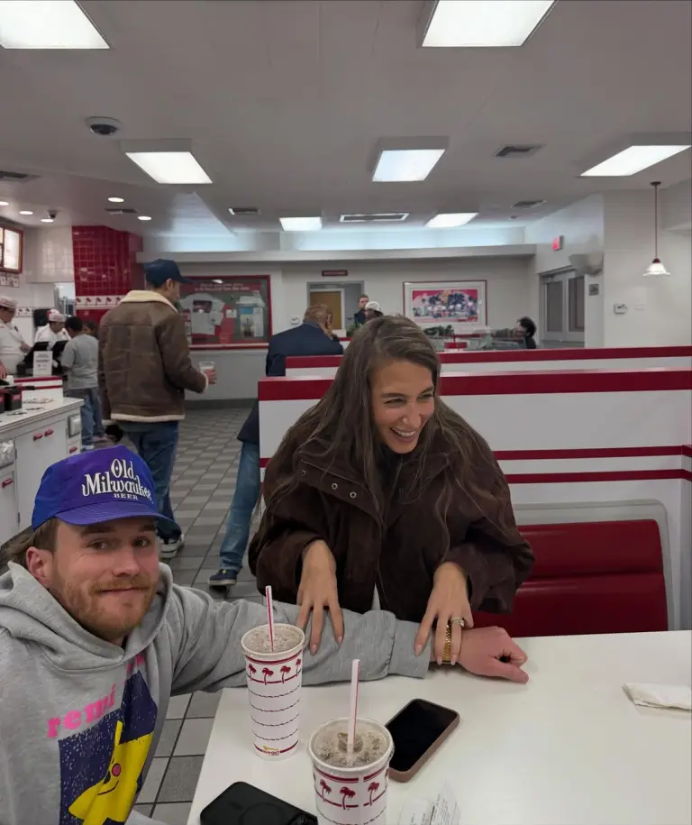 Batula and Wilson at a restaurant [via West Wilson on Instagram]