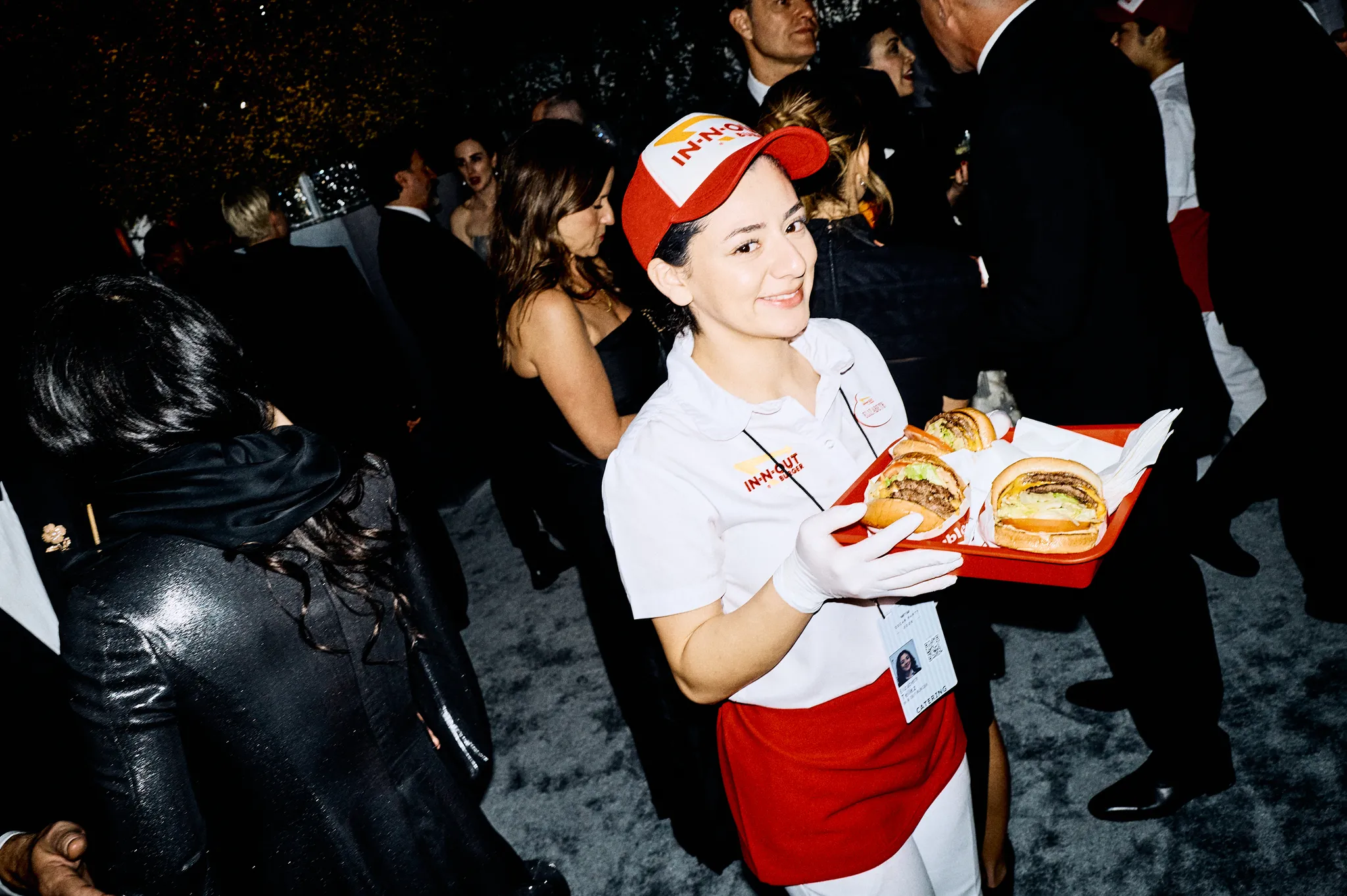 In-N-Out Employee Handing Out Burgers [Photo Courtesy: Myles Hendrik]