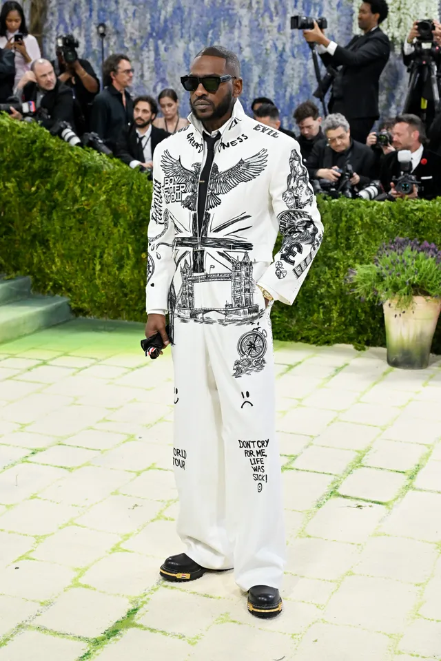 Skepta in Thom Browne [Photo Courtesy: Getty Images]