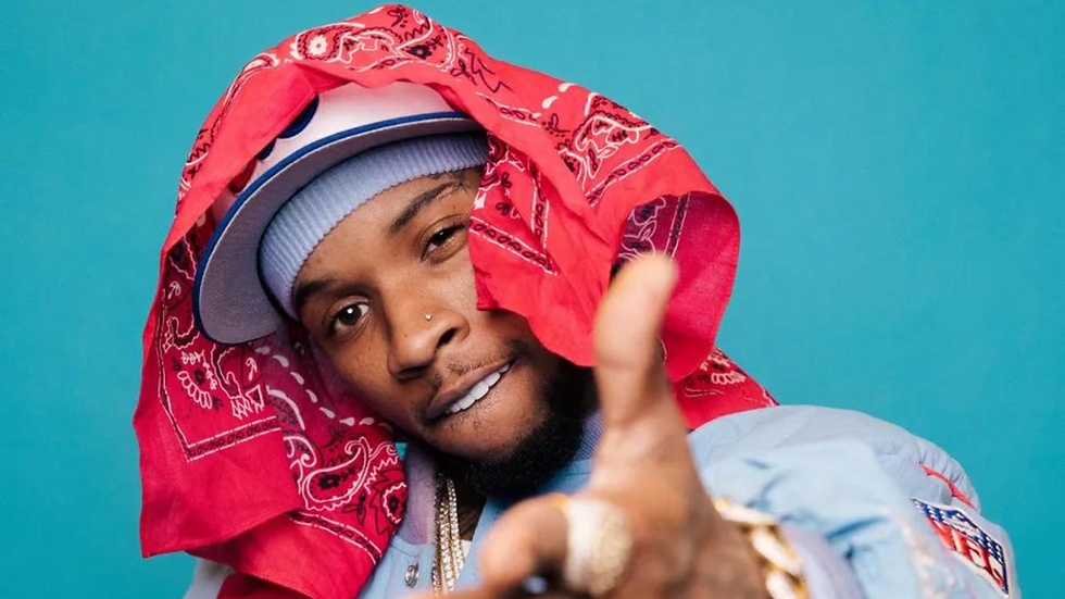 Tory Lanez poses for a photo