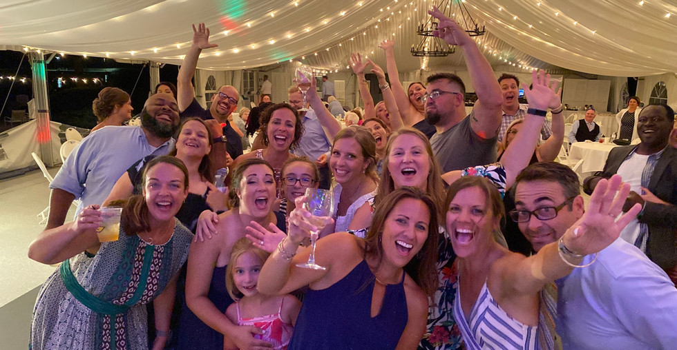 Audience posing for photo and cheering