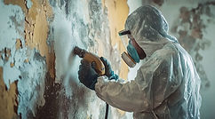 person-protective-gear-mask-using-electric-sander-remove-peeling-paint.jpg