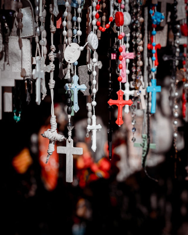 crosses hanging on beaded chains