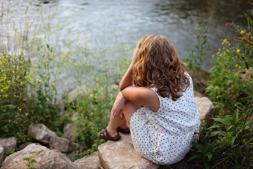 Woman looking at lake