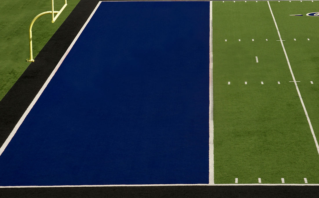 A football field with a blue end zone_edited.jpg