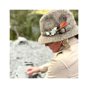 Rydal water, Cumbria woman with handmade ceramic acorn and oak leaves