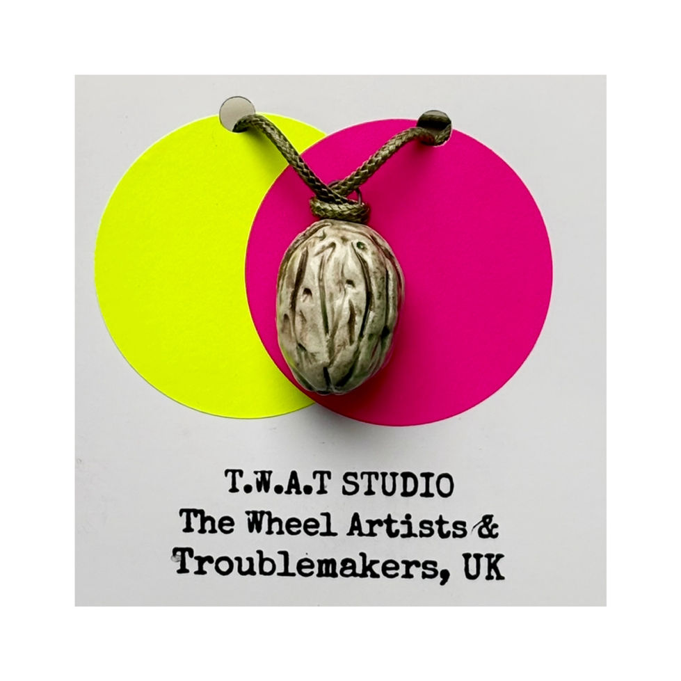 walnut pendant on presentation card
