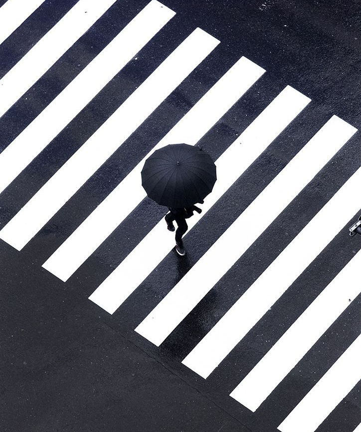 background Yoshinori Mizutani captures the colourful, rain soaked commuters of Tokyo.jpe