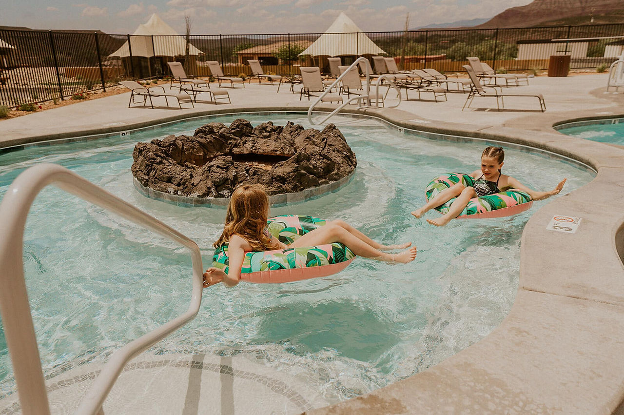 Kids Playing in the swimming pool at Zion Wildflower in Virgin, UT