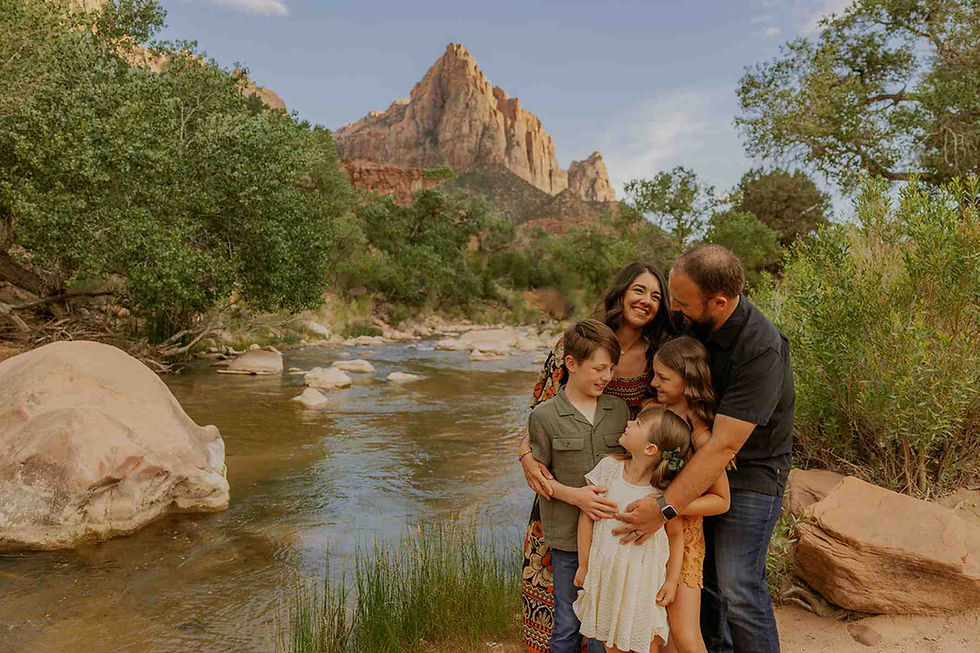 Family hiking and exploring Zion National Park during photo session
