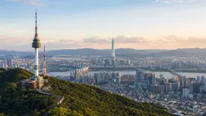 Seoul observatory views with N Seoul Tower, Lotte World Tower, Han River, mountains, and city skyline
