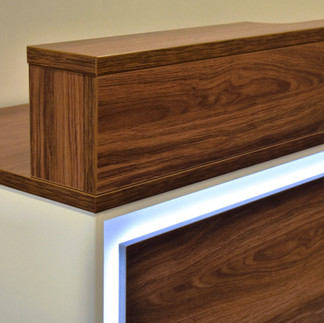 White mobile coffee station with wood top, drawers, and cupboard storage- with light up feature panel for eye catching display