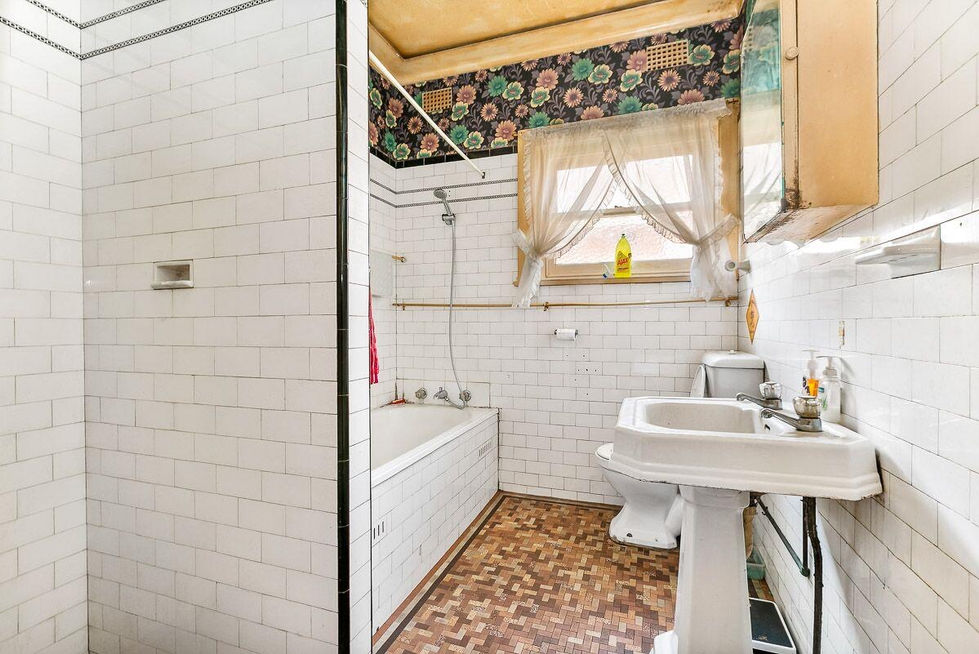 Original Kingsgrove bathroom with vintage fittings before full renovation