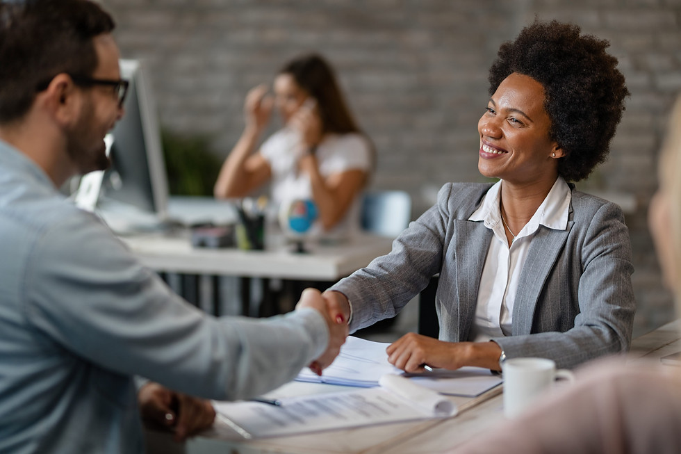 happy-african-american-bank-manager-shaking-hands-with-client-after-successful-agreement-o