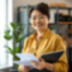 asian professional in her mid-40s and 50s working