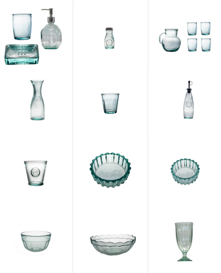 Clear glass objects including jars, bottles, and bowls with a light blue tint arranged against a plain white background.