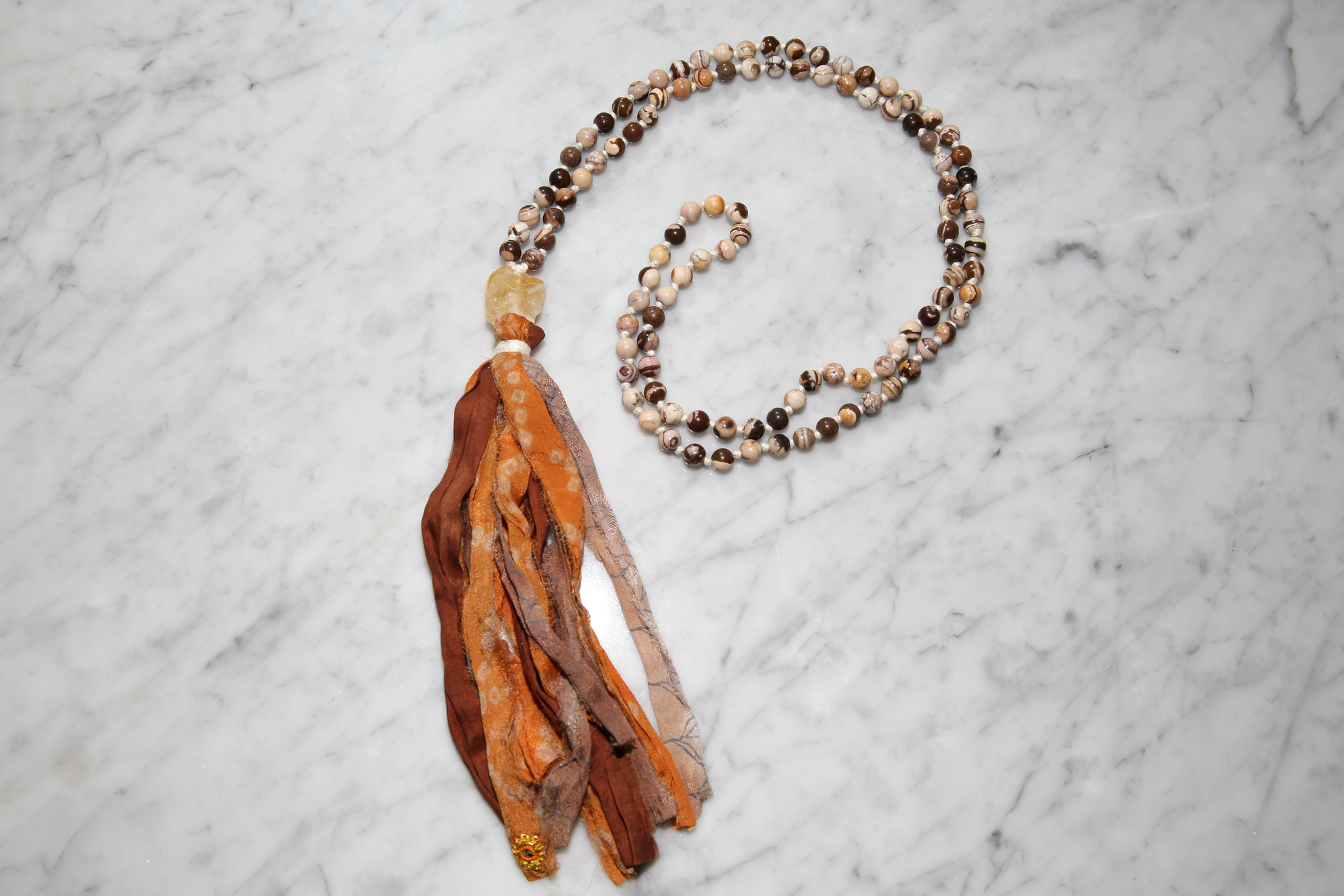Australia zebre, citrine, sari tassel