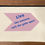 Thumbnail: Back of zip bag with artwork quote that reads "Live like someone left the gate open" by Kelli Noteman O'Brien