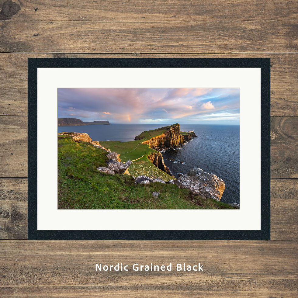 Framed coastal picture of Neist Point Lighthouse on The Isle of Skye, Scotland, UK. Taken in the evening with golden light.