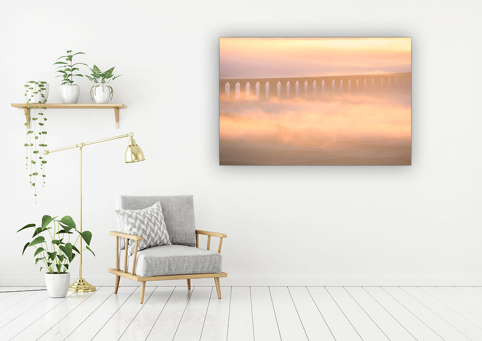 Thumbnail: Dreamy morning mist and fog being illuminated by the early morning light at Ribblehead Viaduct in The Yorkshire Dales, UK.