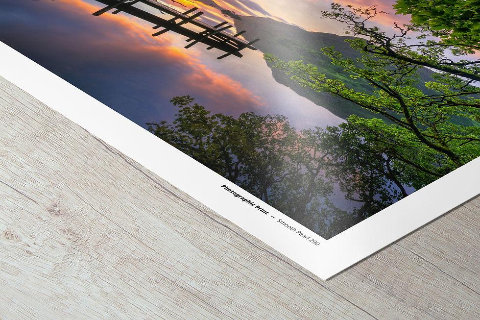 Thumbnail: Beautiful photography prints of a summer sunrise overlooking a wooden jetty at Ullswater in The Lake District, UK.