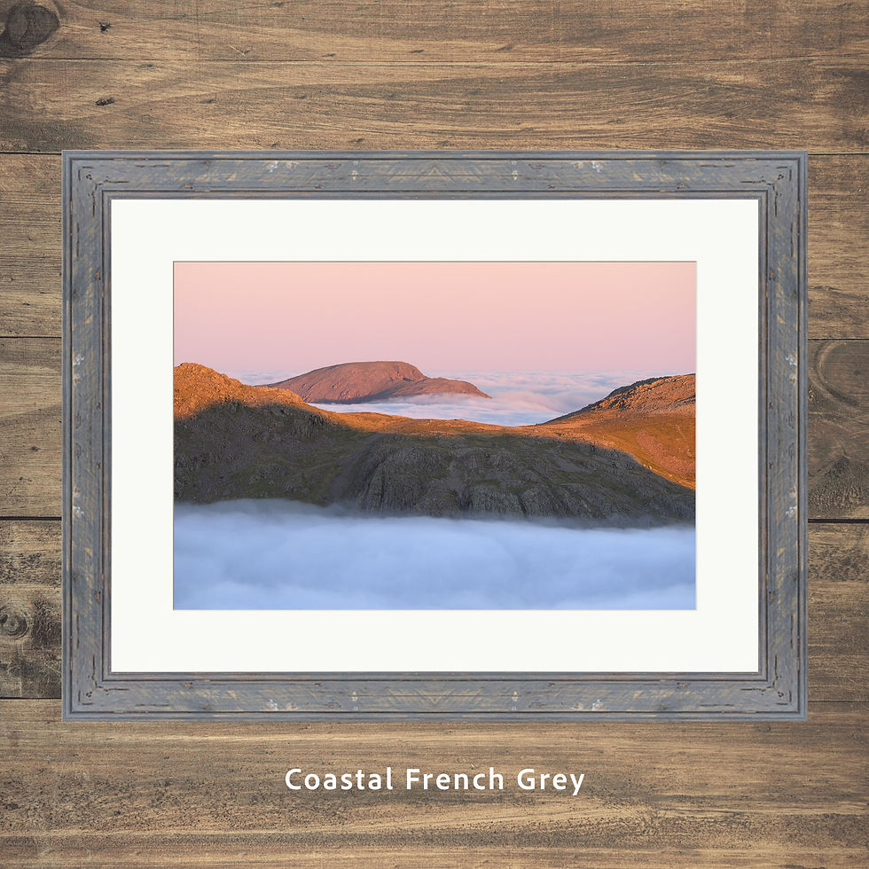 Thumbnail: Framed photography prints of beautiful sunrise light up in the mountains of the Lake District with Pillar poking out of cloud