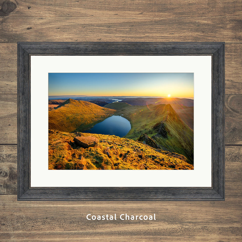 Thumbnail: Framed photography prints of a golden dramatic sunrise overlooking Striding Edge, seen from Helvellyn in The Lake District.