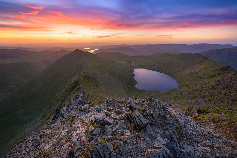 Thumbnail: A breathtaking view overlooking Swirral Edge, Red Tarn & Ullswater, seen from Helvellyn at sunrise in The Lake District.