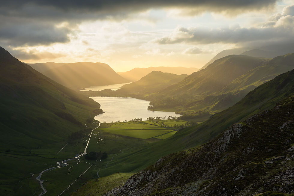 Thumbnail: Photography canvas prints of an incredible view of Buttermere, seen from Haystacks with shafts of golden evening light.