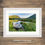 Thumbnail: Framed photography picture prints of a summer view of Crummock Water with an abandoned rowing boat in The Lake District, UK.