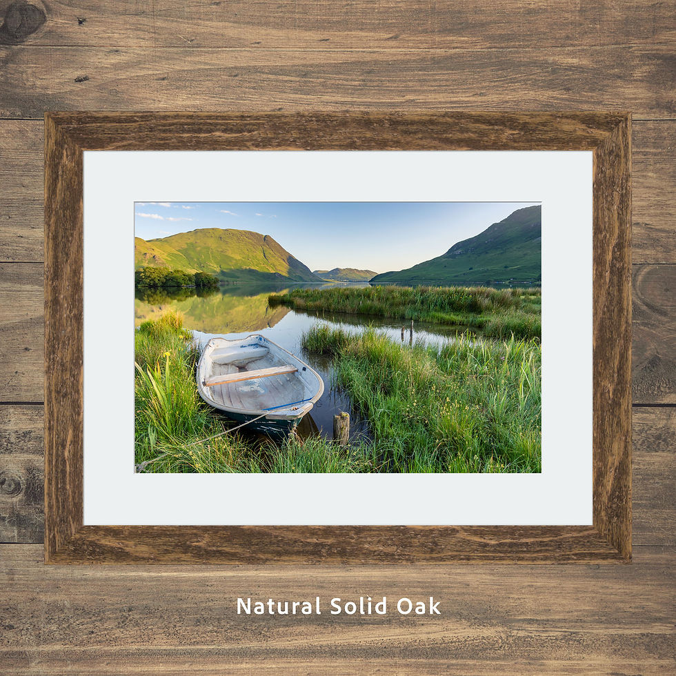 Thumbnail: Framed photography picture prints of a summer view of Crummock Water with an abandoned rowing boat in The Lake District, UK.