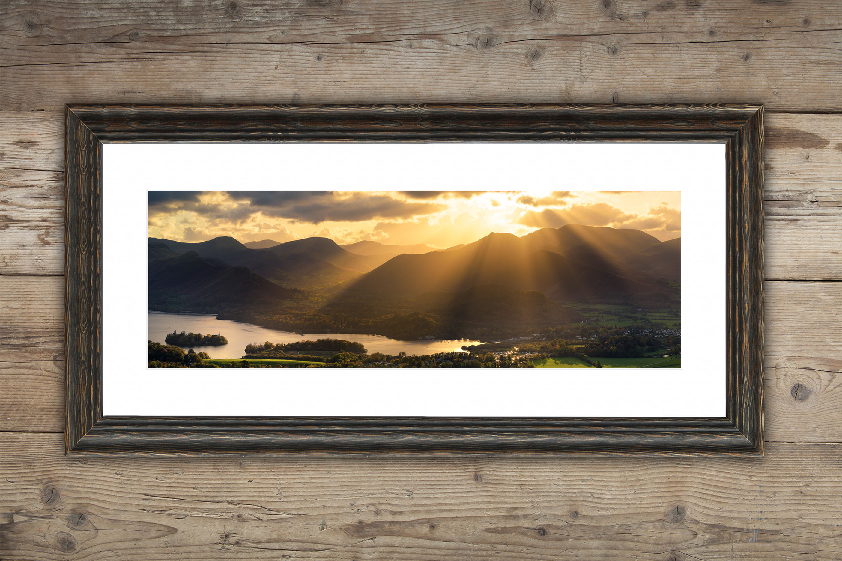 Framed panoramic photography prints of beautiful rays of light over Keswick, seen from Latrigg in The Lake District, UK.