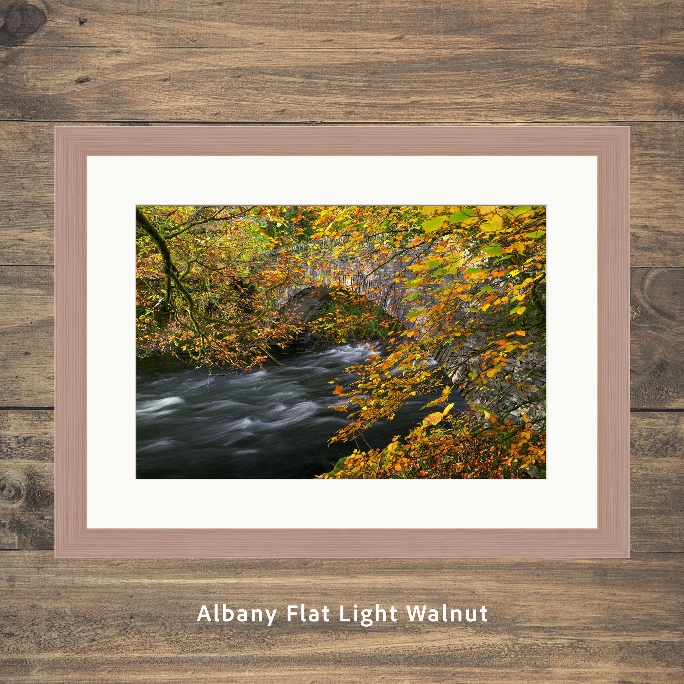 Beautiful framed picture prints of an autumn morning at Clappersgate pack horse bridge in Ambleside, The Lake District.